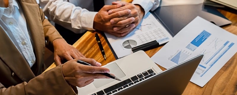 Experts from Devine Consulting offering outsourced bookkeeping and reporting for a business.